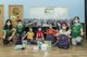 Members of the Hong Kong Hang Lung As One Volunteer Team distribute 
